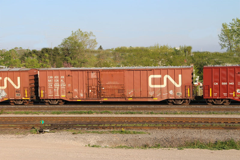 PREORDER Rapido 193004A HO Trenton Works 6348 Boxcar - Ready to Run -- Canadian National (Boxcar Red, Noodle Logo, yellow Conspicuity Marks)