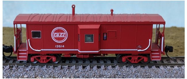 Bluford Shops 42141 International Car Bay Window Caboose Phase 2 - Ready to Run -- Chicago & Eastern Illinois 13514 (red, Buzzsaw Logo), N Scale