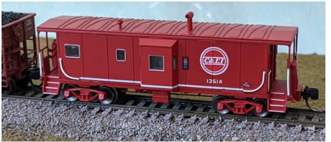 Bluford Shops 42141 International Car Bay Window Caboose Phase 2 - Ready to Run -- Chicago & Eastern Illinois 13514 (red, Buzzsaw Logo), N Scale