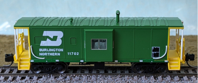 Bluford Shops 44250 International Car Bay Window Caboose Phase 4 - Ready to Run -- Burlington Northern 11702 (Cascade Green, Logo on Left), N Scale