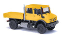 PREORDER Busch HO 51080 2013 Mercedes-Benz Unimog U 5023 Crew-Cab Low-Side, Yellow | 42.49