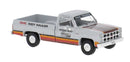 Brekina HO 19657 1981 GMC Sierra Grande Pickup Truck, Assembled, Indy Hauler (silver, orange, black)