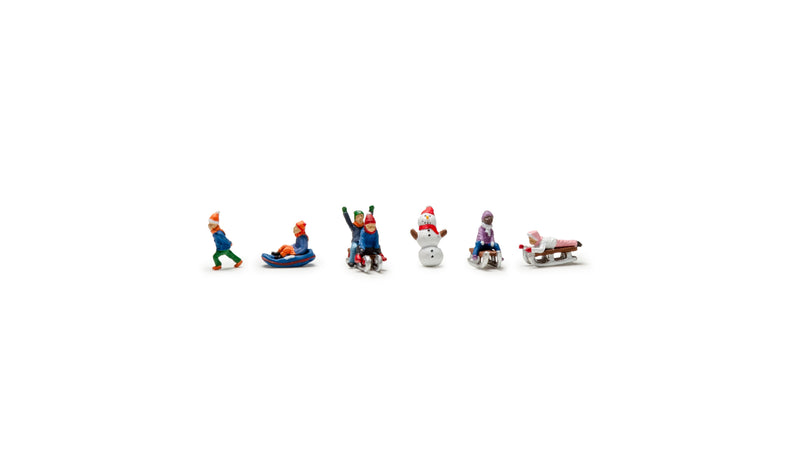 Woodland Scenics A2221 Children Sledding - Scenic Accents(R) -- 5 Children, Snowman, N Scale