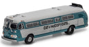 Model bus with 'Cat & the Cow' branding on a white background