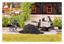 PREORDER Busch HO 79940 Charcoal Burner at Work, Action Set, Includes Worker, Wheelbarrow, Hand Tools, Charcoal Pile