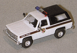 Trident Miniatures 90207 Chevrolet Blazer - Emergency - Police Vehicles -- Maryland State Police (white, Brown Stripe, Black Bed Cover), HO Scale