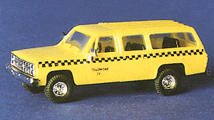 Trident Miniatures 90167 Chevrolet Suburban - Taxis -- Yellow Cab (yellow, Black Checkerboard Graphics & Lettering), HO Scale