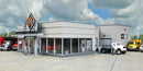 Walthers Cornerstone 933-4025 International Truck Dealership -- Kit - 8-7/8 x 12-1/4 x 3-7/8" 22 x 31.1 x 9.3cm, HO Scale