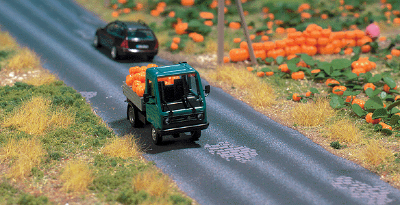 Busch Gmbh & Co Kg 1105 Asphalt Street w/Potholes -- 2-5/8 x 39" 6.6cm x 1m, HO Scale